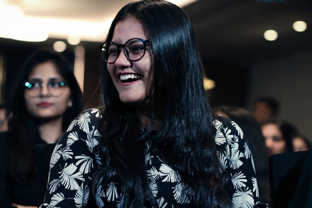Bride smiling while getting ready